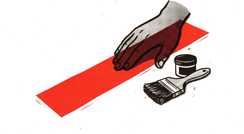 A hand pressing a freshly inked red strip of paper onto a sheet