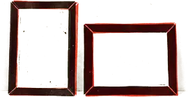 One tall picture frame and one wide one, leaning against a wall
